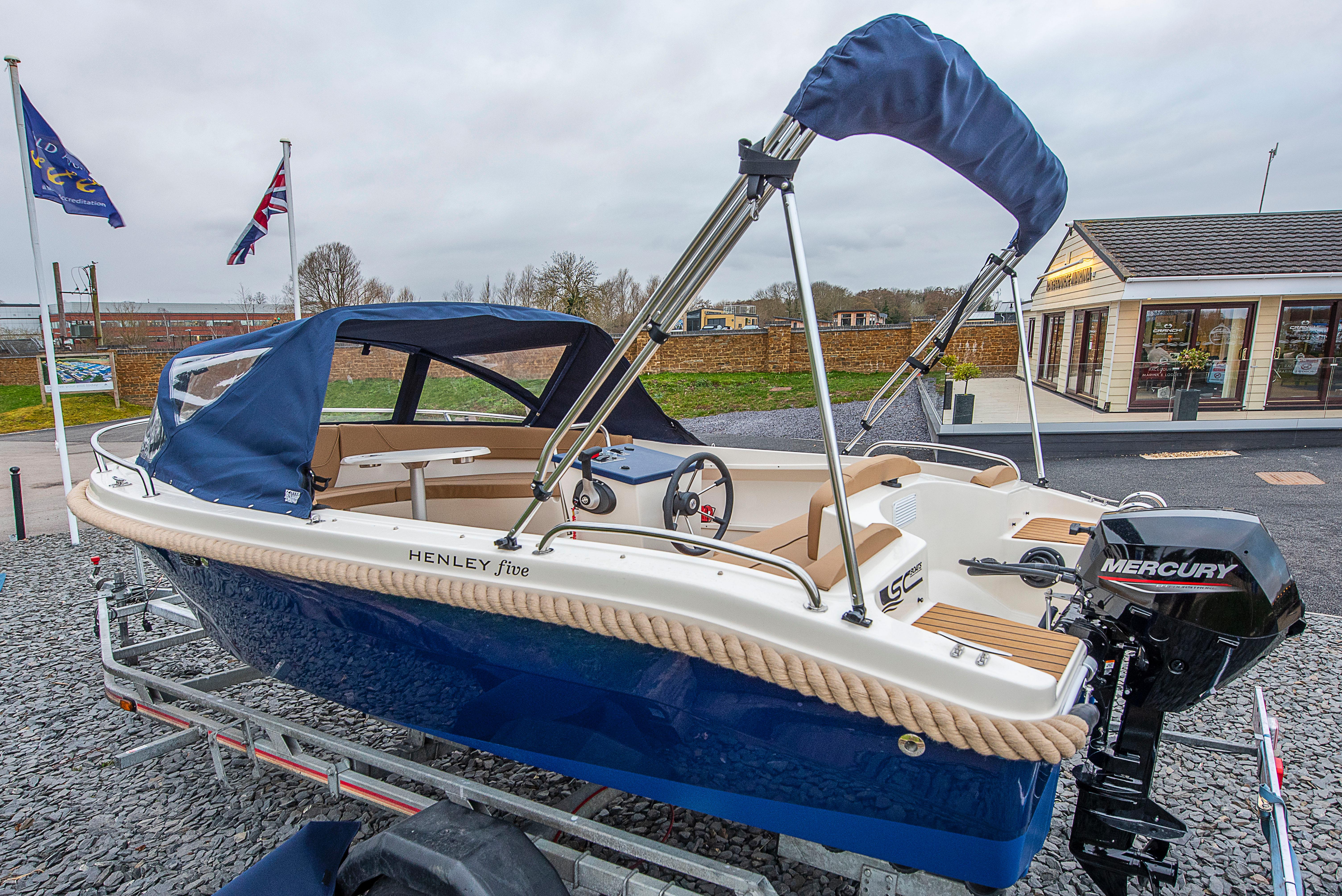 Blue and white British-built Henley Five dayboat